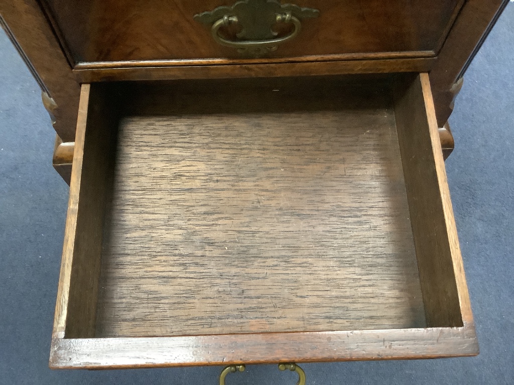 An 18th century style figural walnut small chest with five drawers, width 36cm, depth 30cm, height 72cm